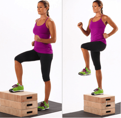 Step up and hold. Try to keep supporting knee from falling inwards on the step up.