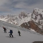 14 Heading up beside Zamok Glacier, Chimtarga (5489m) in background – Rich Emerson