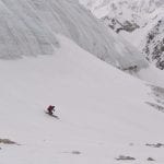 16 Rich skiing past snout of Zamok Glacier