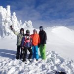 Jim in orange jacket with family; daughter Kate, son Tim and son-in-law Nick