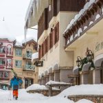 Skiiers walking through the village at Sun Peaks Resort