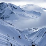 Jake Cohn skis off of Whistler’s new Harmony 6 chair on a late season pow day