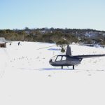 snowy mountain wilderness picnic heli