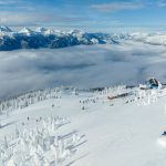 Skier carving down a trail in the Sub Peak area of Mount Mackenzie, Revelstoke.